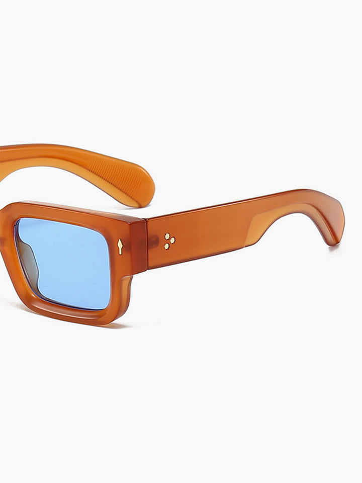 Occhiali da sole, montatura trasparente color ambra con lenti blu, acetato, Donna