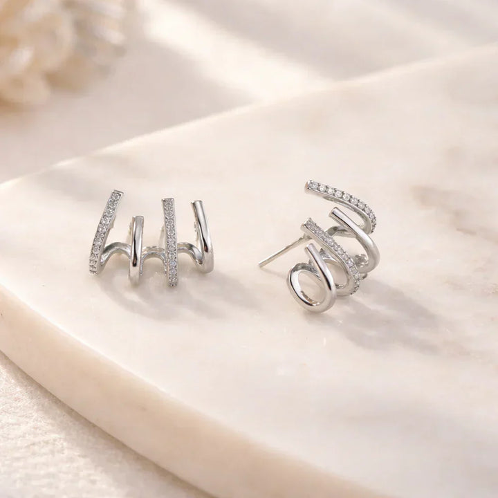 Elen – Bracciale Orecchio a Spirale Scolpito Illusione