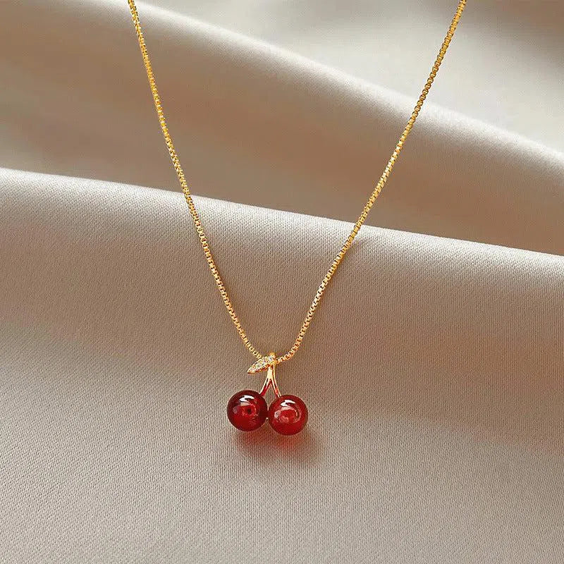 Cléora | Collana d'oro con pendenti a forma di ciliegia scintillanti