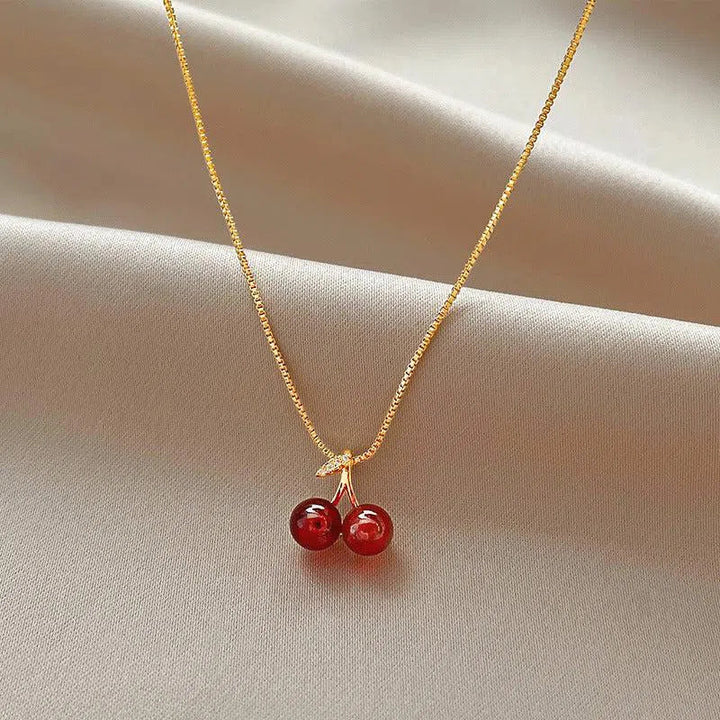 Cléora | Collana d'oro con pendenti a forma di ciliegia scintillanti