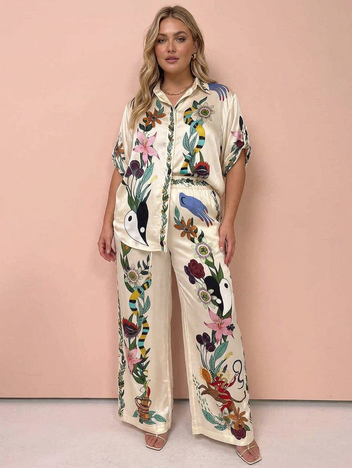 Nika | Set camicia e pantaloni in satin Resort Vibes con stampa unica